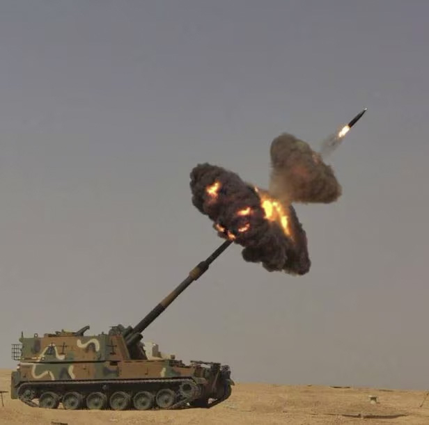This undated file photo shows an extended-range shell being fired from a self-propelled howitzer. (Poongsan)