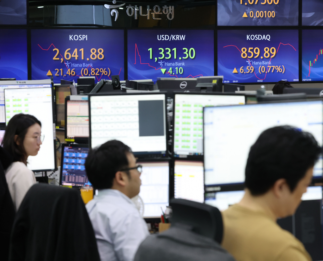 Electronic boards signboards show stocks and currency movements in South Korea at a Hana Bank dealing room in central Seoul, Thursday.