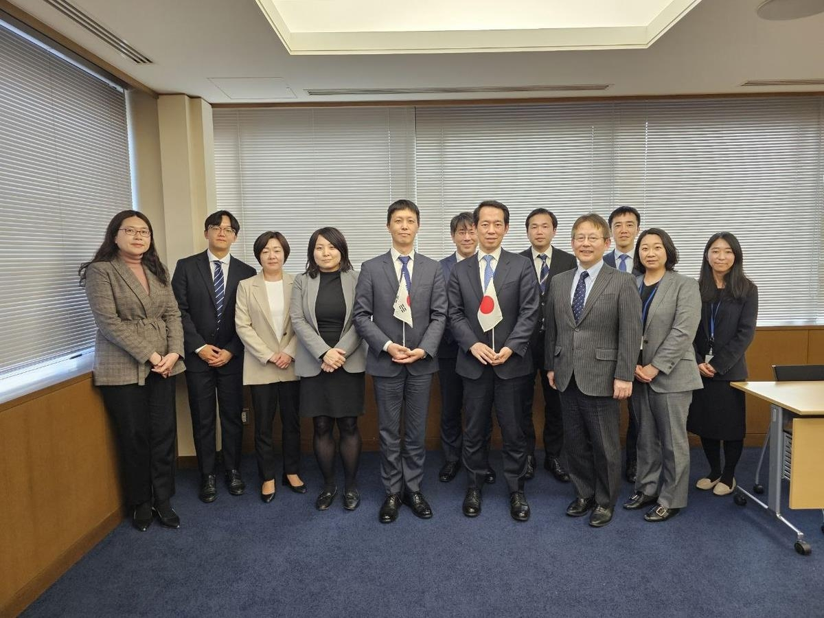 Youn Jong-kwon (fifth from left), director-general for nuclear nonproliferation and diplomatic planning at the foreign ministry, poses for a photo with his Japanese counterpart, Katsuro Kitagawa (sixth from right), prior to their talks at the Japanese foreign ministry on Feb. 16, 2024, in this photo provided by the South Korean foreign ministry. (Yonhap)