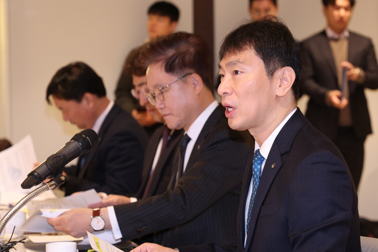 Lee Bok-hyun, chief of the Financial Supervisory Service, speaks during a meeting with heads of financial holding companies to discuss financial affairs for the new year at the Federation of Banks in Seoul, in this file photo taken Jan. 9, 2024. (Yonhap)