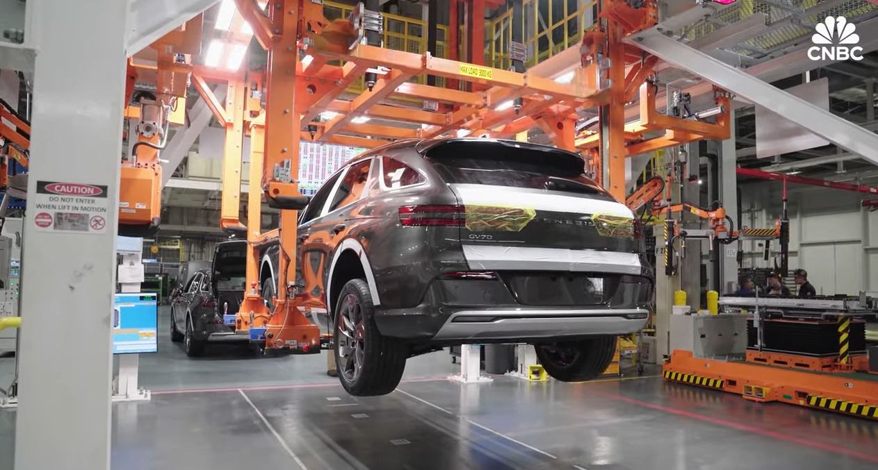 Cars are being made at local production plants in the US. (CNBC Youtube)