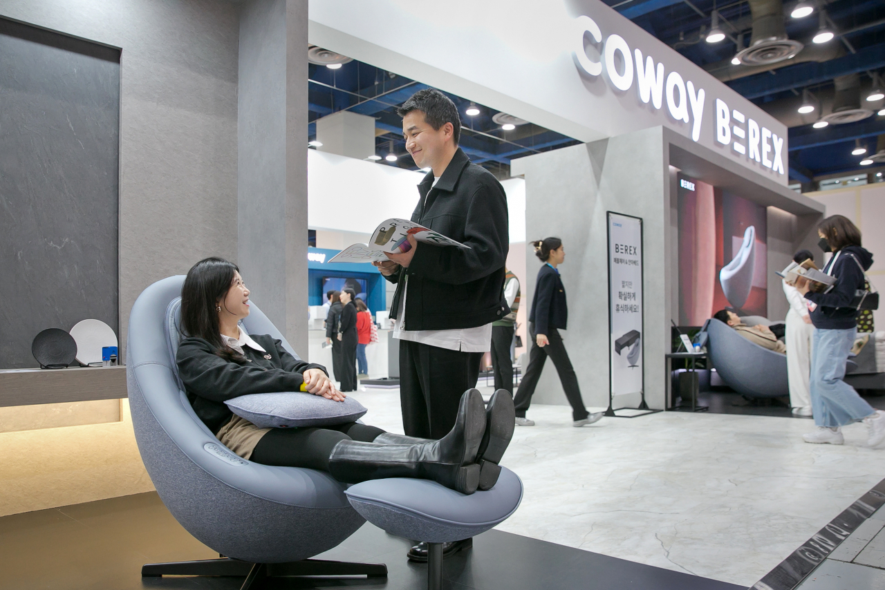Coway’s latest massage chairs at the 2024 Seoul Living Design Fair at Coex in southern Seoul on Thursday. (Coway)