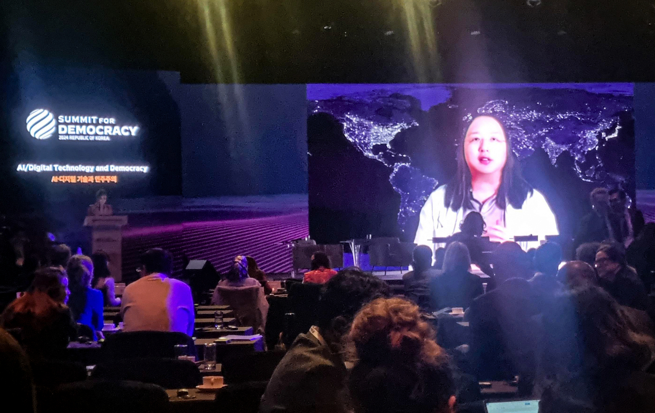 Audrey Tang, Taiwan's minister of digital affairs, speaks virtually during a session of the third Summit for Democracy, in this image captured from the YouTube channel of the summit on Monday. (Yonhap)