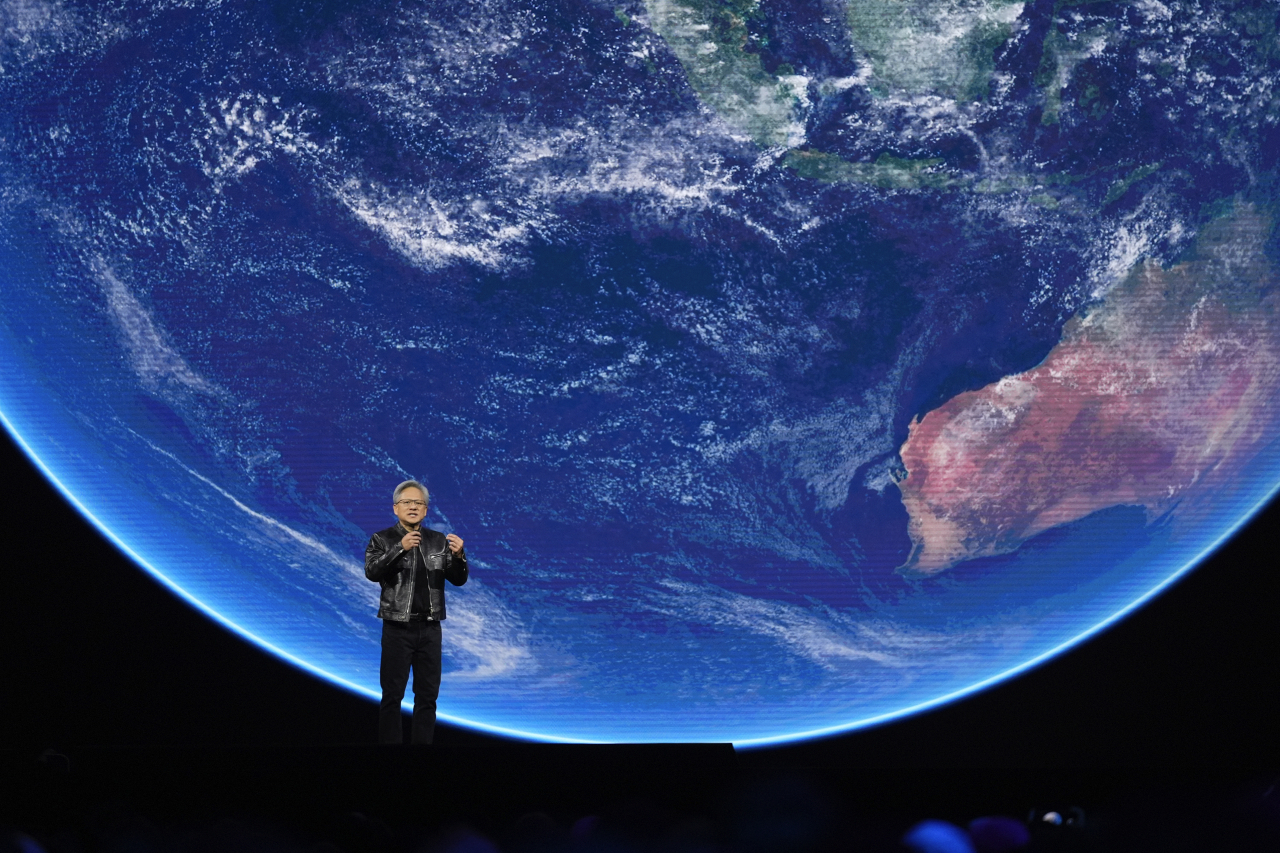 Nividia CEO Jensen Huang speaks about AI and climate during the keynote address of Nvidia GTC in San Jose, California on Monday. (AP-Yonhap)
