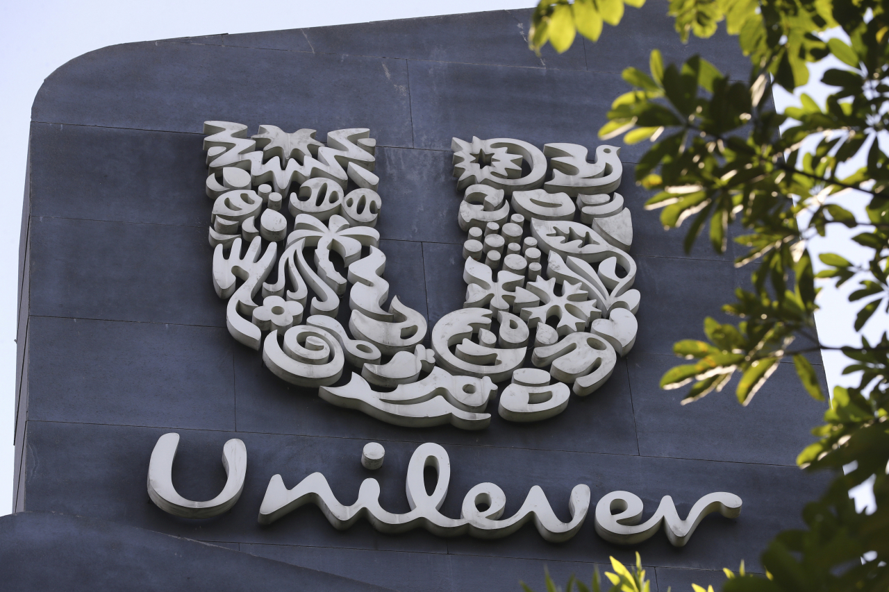 A Unilever logo is displayed outside the head office of PT Unilever Indonesia Tbk. in Tangerang, Indonesia, on Nov. 16, 2021. (AP- Yonhap)
