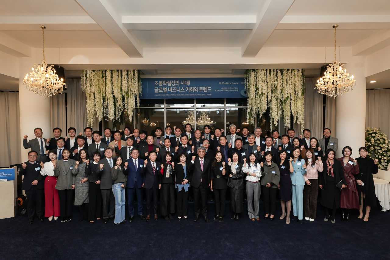 CEOs and guests pose for group photos at The Korea Herald’s Global Biz Forum 2024, in Seoul, Wednesday. (The Korea Herald)