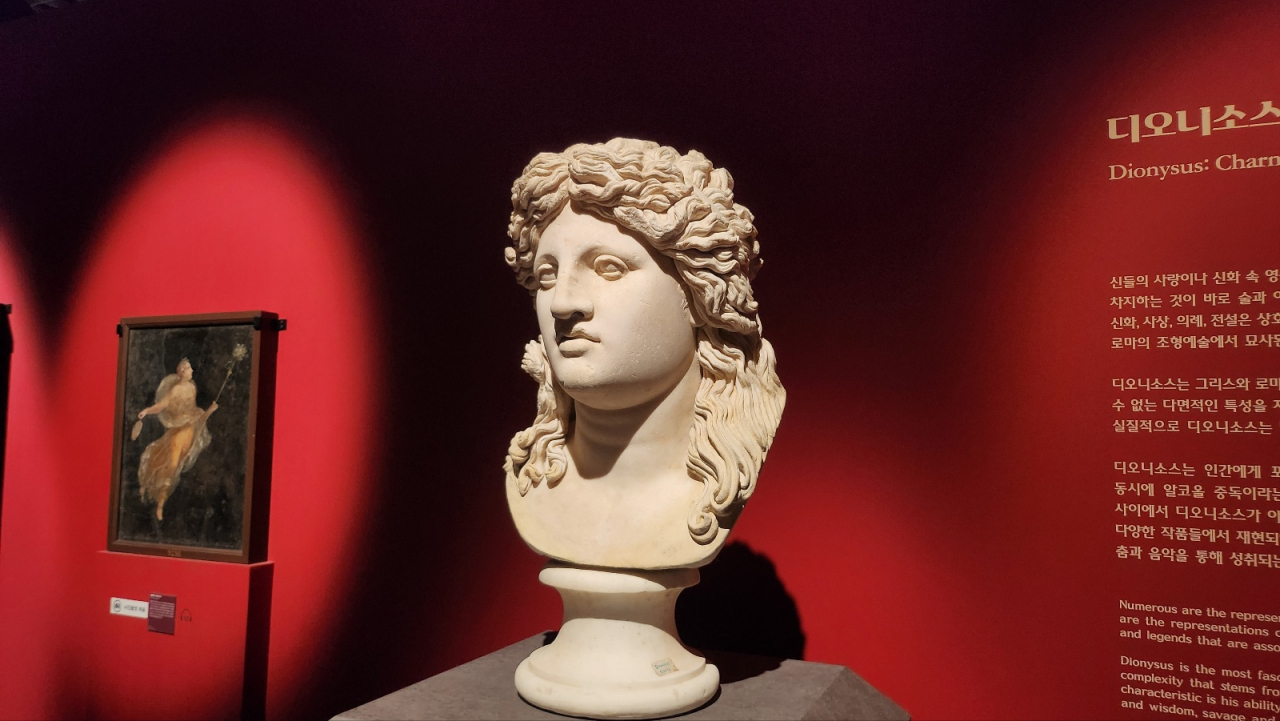 A bust of the god Dionysus is displayed at the 
