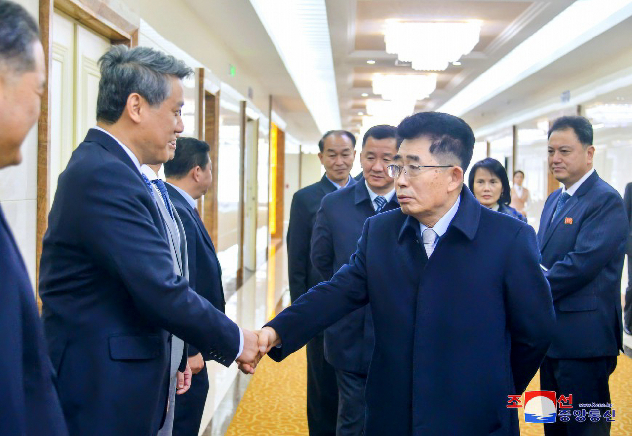This image shows Kim Song-nam (Right), head of the country's ruling party delegation, before he embarked on a three-nation tour to China, Vietnam and Laos on Thursday. (KCNA)