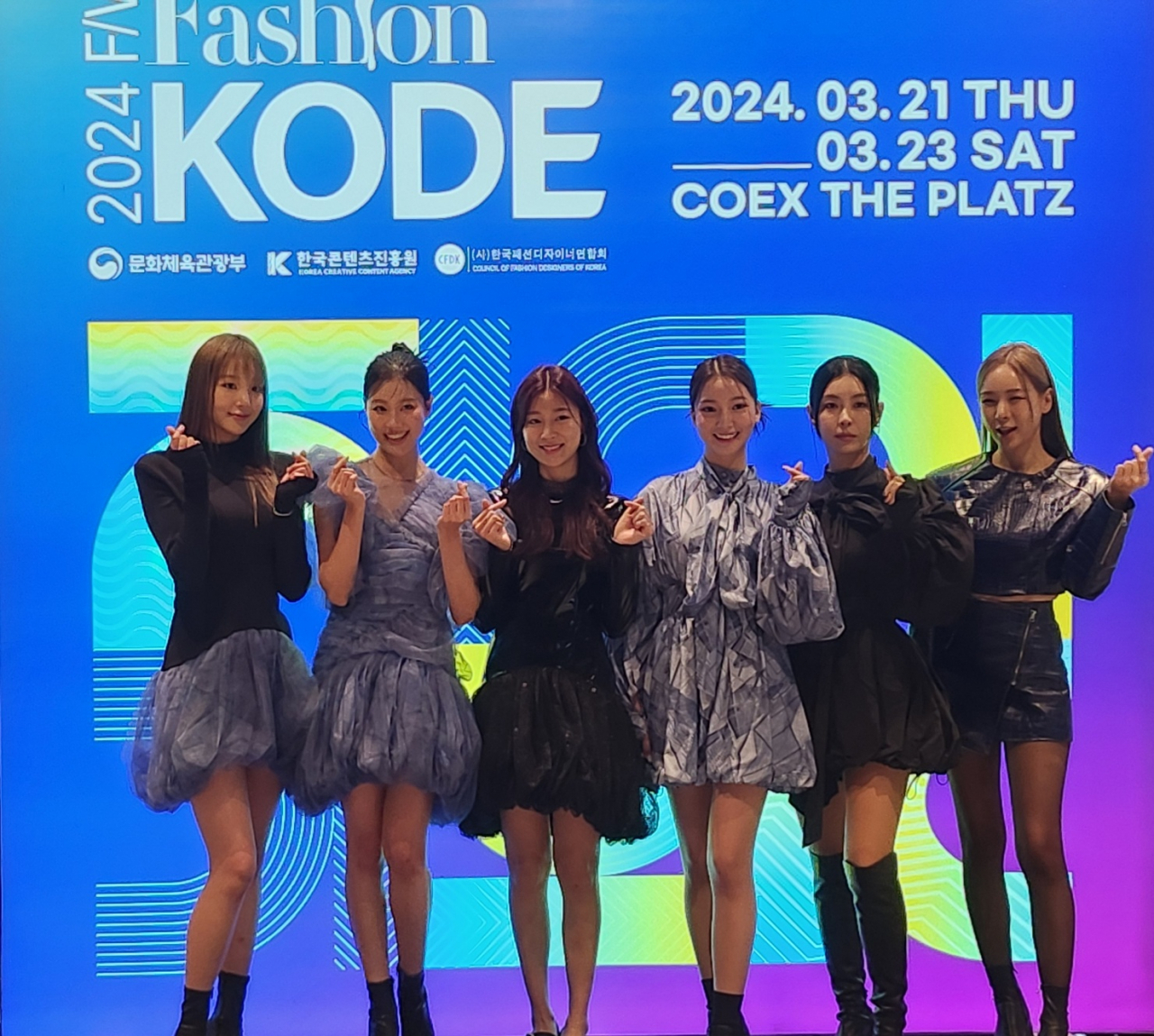 Models pose for a photo during the 2024 Fashion KODE at Coex in Seoul on Friday. (Choi Si-young/The Korea Herald)