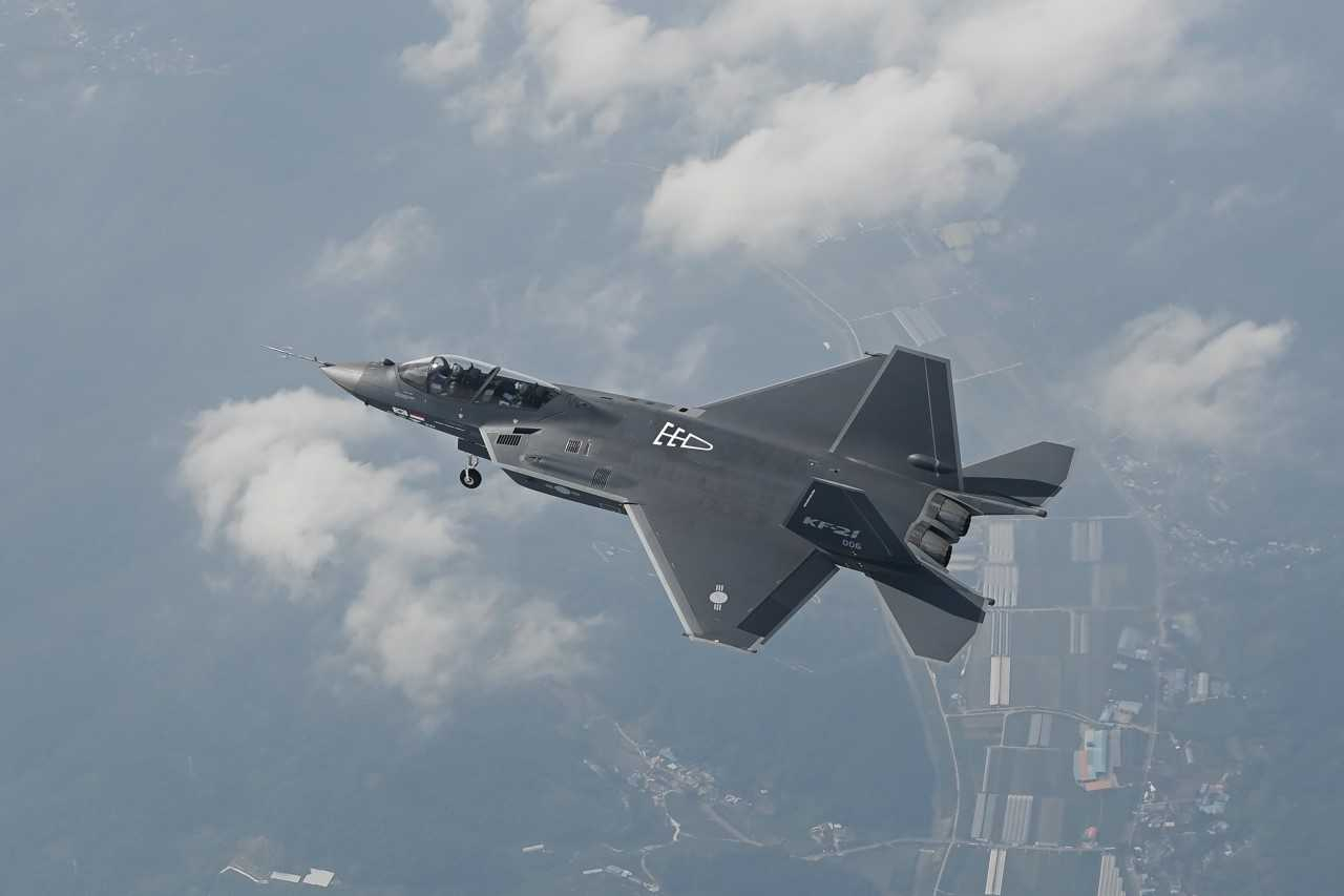 This file photo shows the sixth and final prototype of the KF-21 fighter jet conducting its first flight in June 2023. (Defense Acquisition Program Administration)