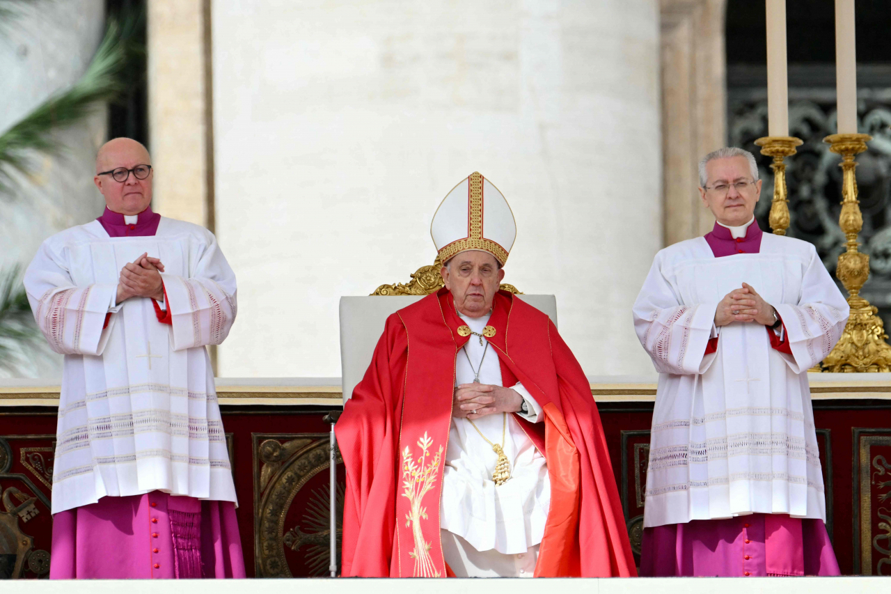 Pope Francis presides the Palm Sunday mass at St Peter's square in the Vatican on Sunday. (AFP)