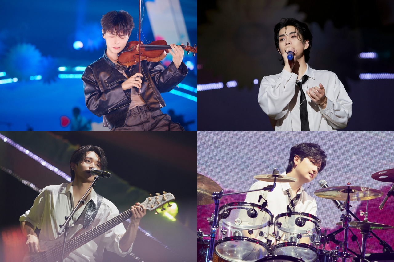 Clockwise from top left: Lucy members Ye-chan, Sang-yeop, Gwang-il and Won-sang perform during the group's first world tour, “Written by Flower,” at the SK Olympic Handball Gymnasium in Seoul, Saturday. (Mystic Story)