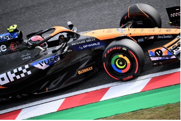 The McLaren F1 car sporting the Vuse livery in action during the 2024 F1 Japanese Grand Prix (BAT)