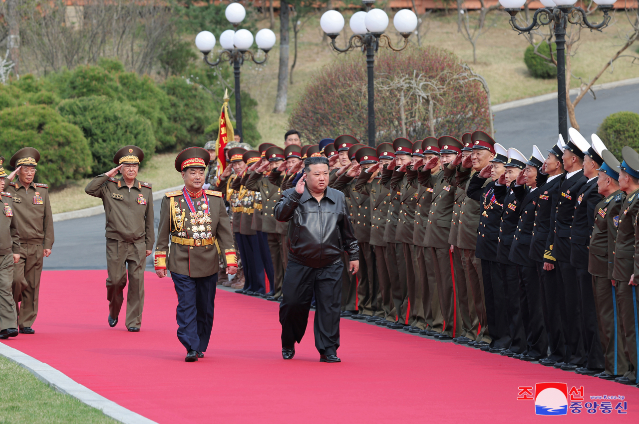 North Korean leader Kim Jong-un (Center) visits the Kim Jong-il University of Military and Politics on Wednesday. (KCNA)