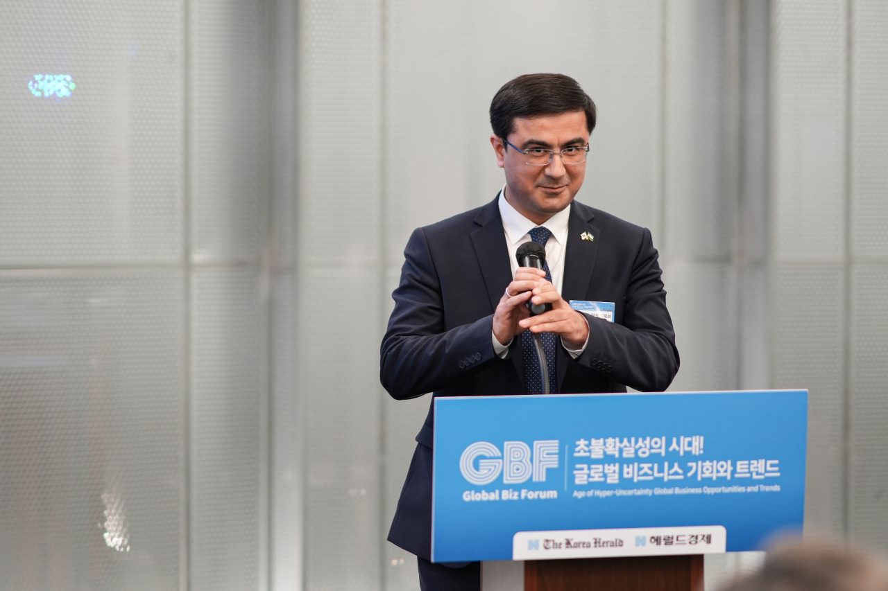 Fazliddin Arziev, counselor of the Embassy of Uzbekistan in Seoul, gives a speech during the Global Business Forum held in Seoul, Thursday. (The Korea Herald)