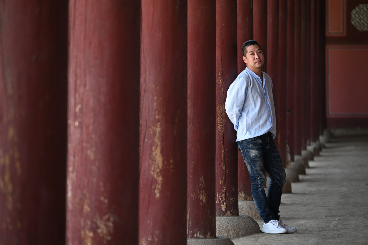 Song Jae-sung, the director overseeing Gyeongbokgung shows during the K-Royal Culture Festival this week, poses for a photo at the palace on April 22. (Im Se-jun/The Korea Herald)