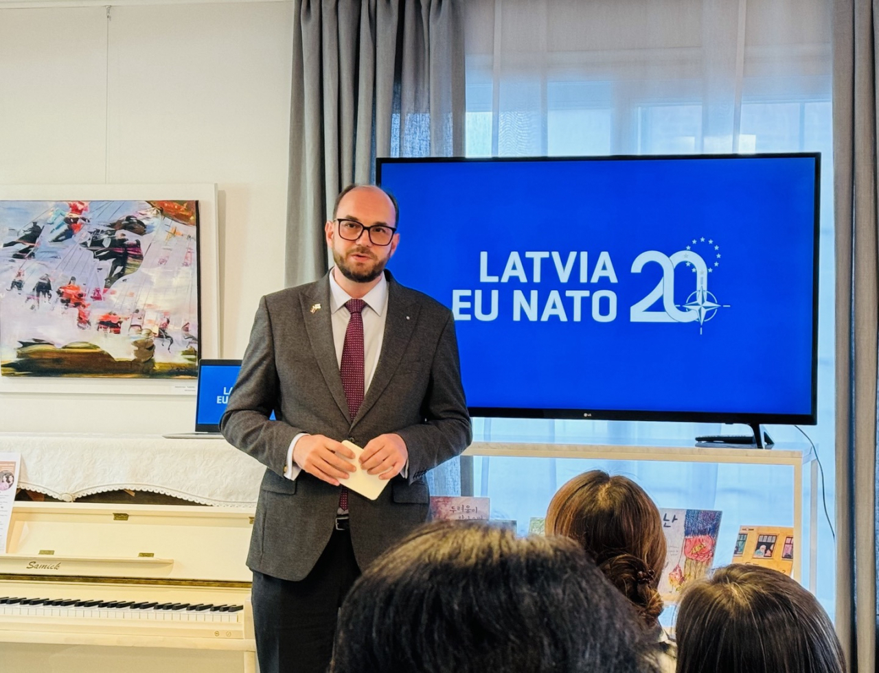 Latvian Ambassador to Korea, Aris Vigants speaks at an event commemorating 20th anniversary of EU, NATO membership at Latvian Embassy in Seoul on Wednesday.(Sanjay Kumar/The Korea Herald)