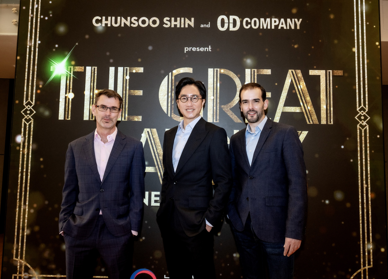 From left: Composer Jason Howland, OD Company CEO and producer Shin Chun-soo and director Marc Bruni pose for photos during a press conference at the Korean Cultural Center in New York on Friday. (OD Company)
