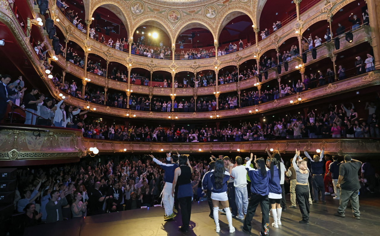 French dance team Pockemon Crew and Korean dance studio 1Million greet the audience at the Chatelet Theatre in Paris on Thursday. (Culture Ministry)