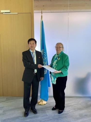 Jo Chol-su (L), the new North Korean ambassador to the United Nations Office at Geneva, presents his credentials to Tatiana Valovaya, director-general of the UN office, on May 10, 2024, in this photo posted on the UN website. (Yonhap)
