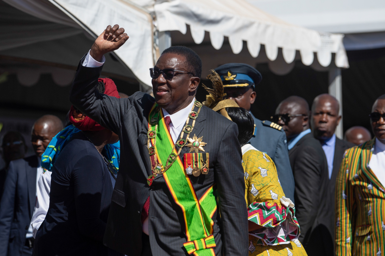 Zimbabwe's President Emmerson Mnangagwa waves as he attends the celebration for the country's 44th Independence Day in Murambinda, Zimbabwe, April 18, 2024. (EPA)