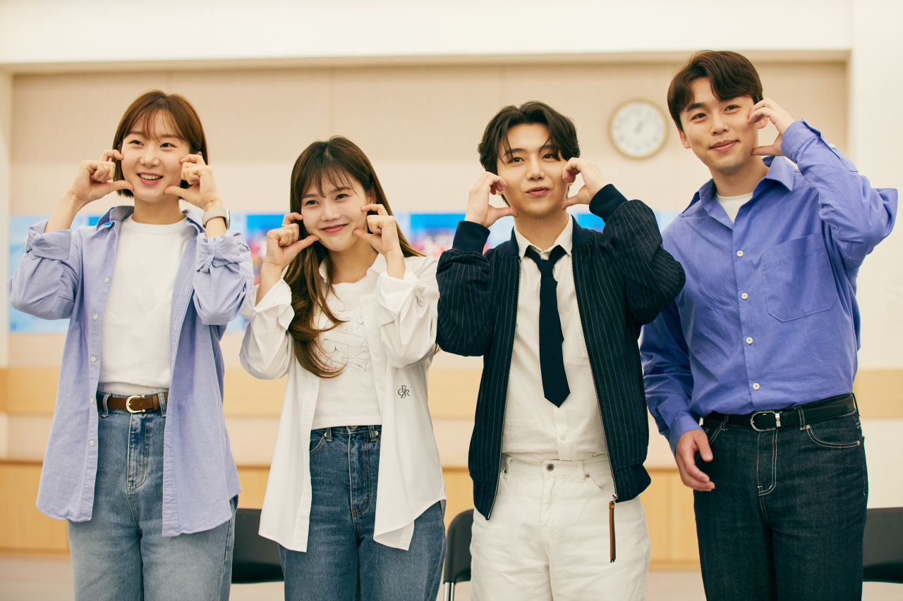 From left, actors Seo Yeon-jung, Hyo-jung, Jin-ho and Yun Tae-ho pose for group photos after a rehearsal. (Seoul Performing Arts Company)