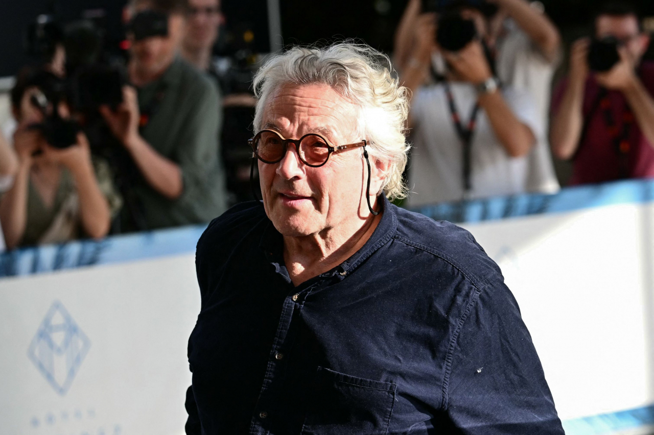 Australian director and screenwriter George Miller arrives at the Grand Hyatt Cannes Hotel Martinez, on the eve of the opening ceremony of the 77th edition of the Cannes Film Festival in Cannes, southern France, on May 13, 2024. (AFP-Yonhap)
