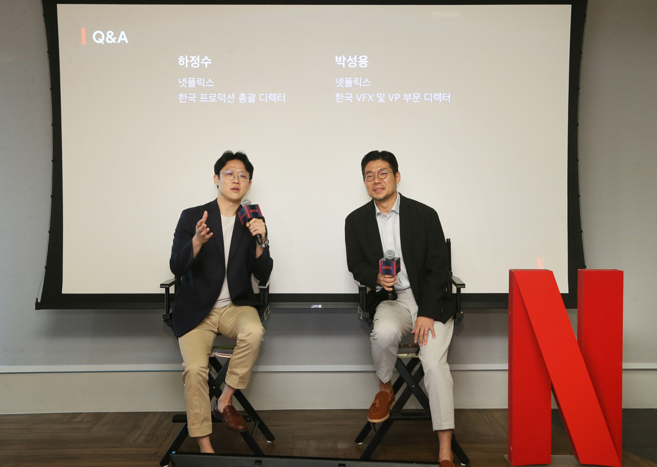 Ha Jung-su (left), head of production at Netflix Korea, and Sunny Park, director of VFX & virtual production at Netflix Korea, speak during a press conference at the Netflix Korea office in Seoul on Friday. (Netflix)