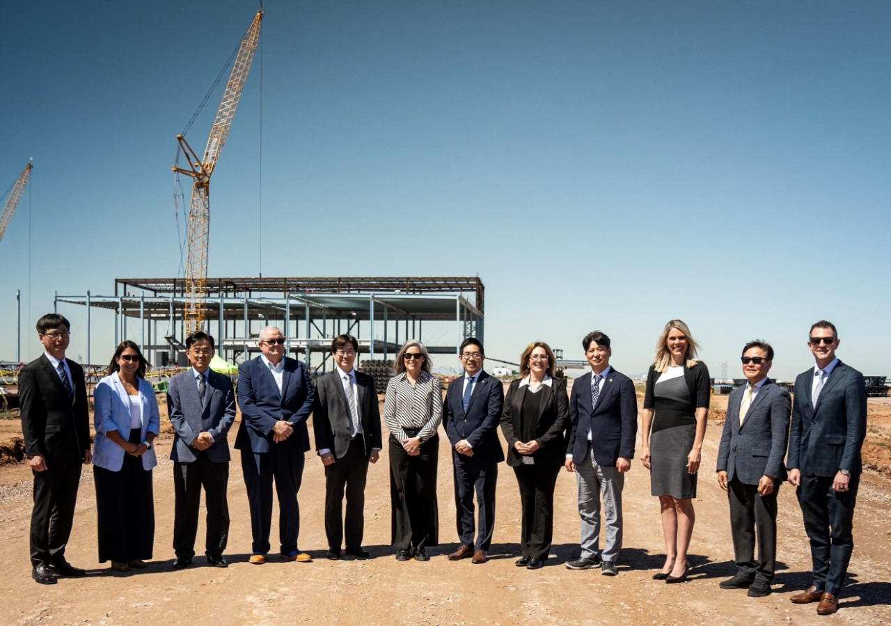 LG Energy Solution and Arizona government officials pose for a photo during the groundbreaking ceremony for LG Energy Solution's Arizona battery complex on Wednesday. Standing center left is Arizona Gov. Katie Hobbs, and on her left stands Richard Ra, president of LG Energy Solution Arizona. (LG Energy Solution)