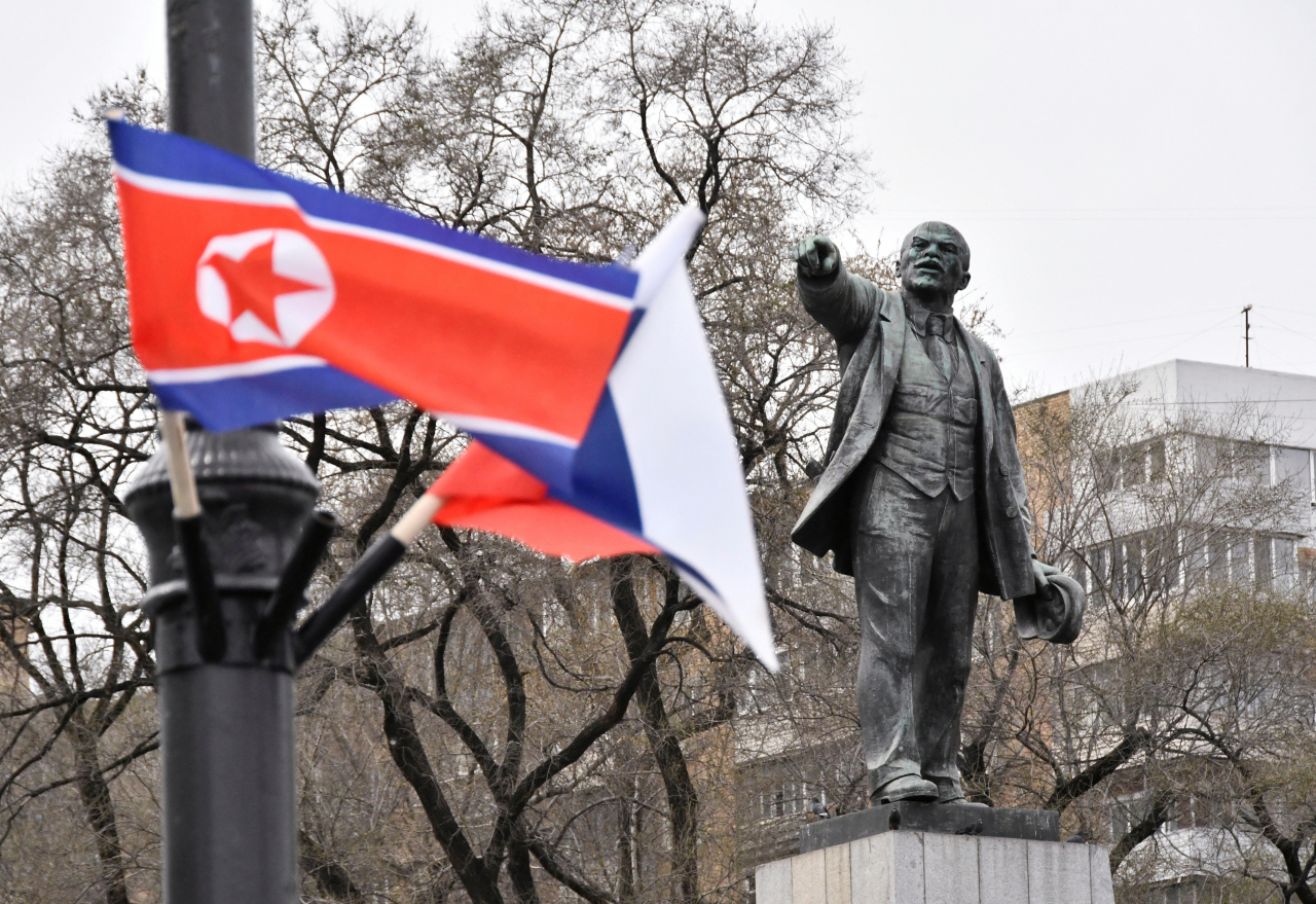 State flags of Russia and North Korea fly in a street near a monument to Soviet state founder Vladimir Lenin during the visit of North Korea's leader Kim Jong-un to Vladivostok, Russia, on April 25, 2019. (File Photo - Reuters)