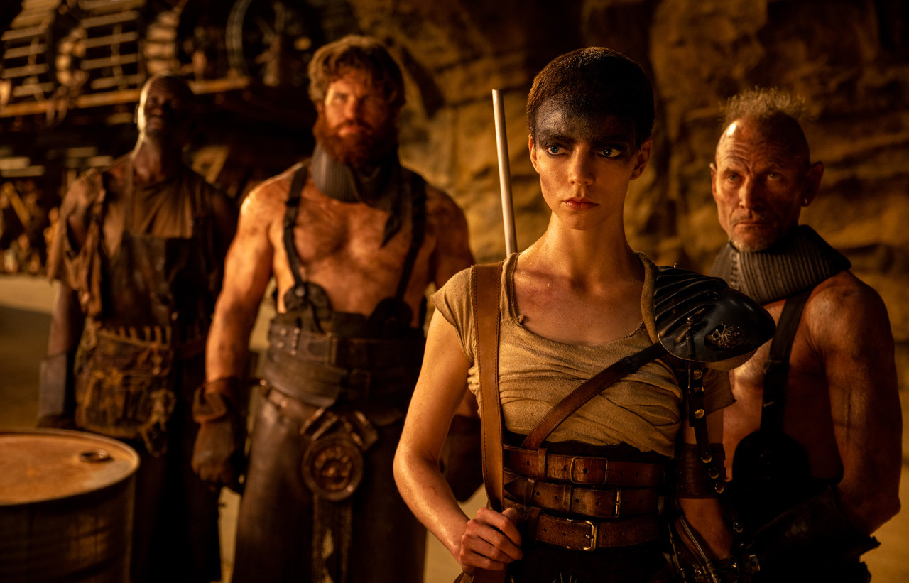 Anya Taylor-Joy (second from right) plays Furiosa in “Furiosa: A Mad Max Saga” (Warner Bros.)