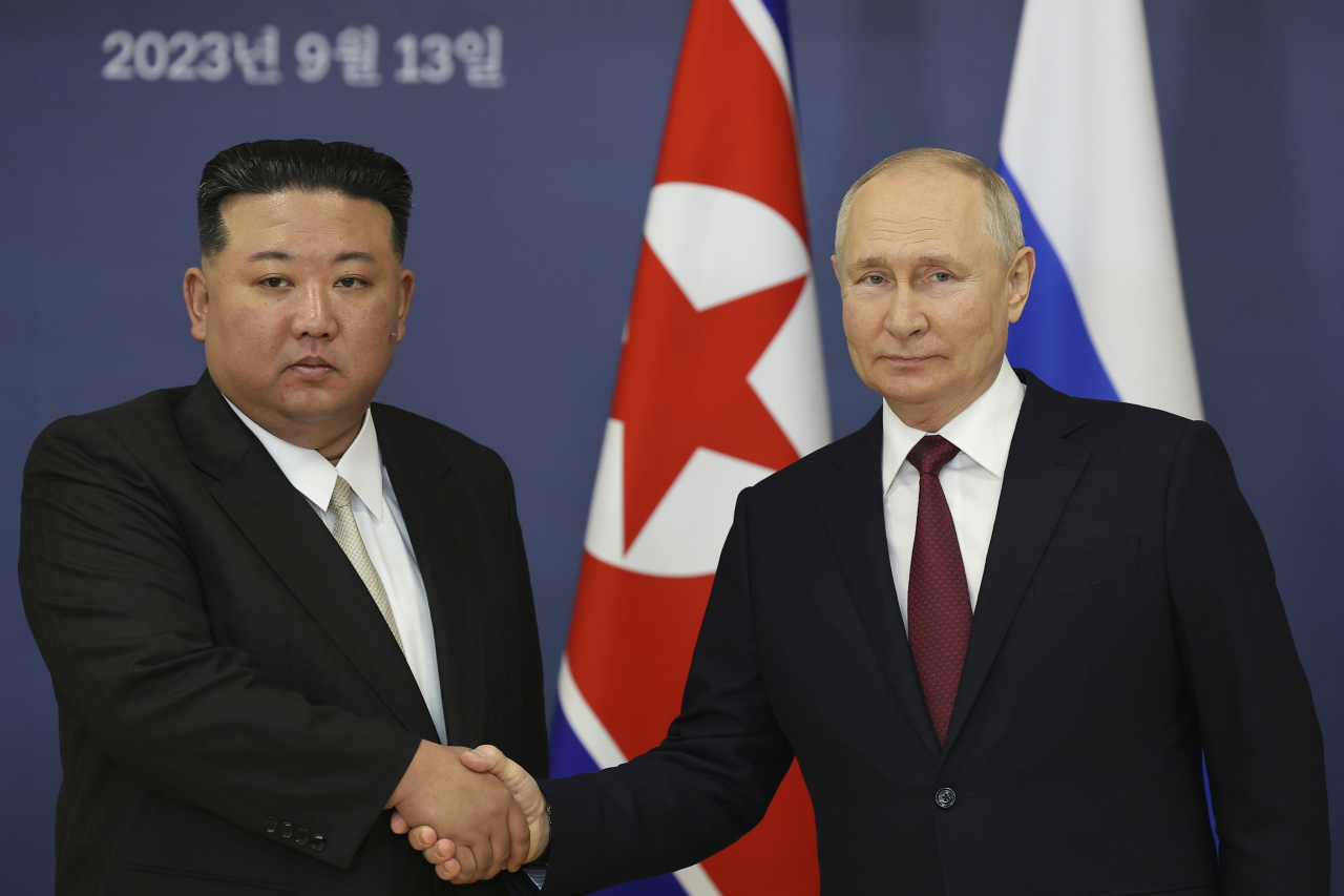 Putin says Russia, N. Korea to develop alternative settlement system