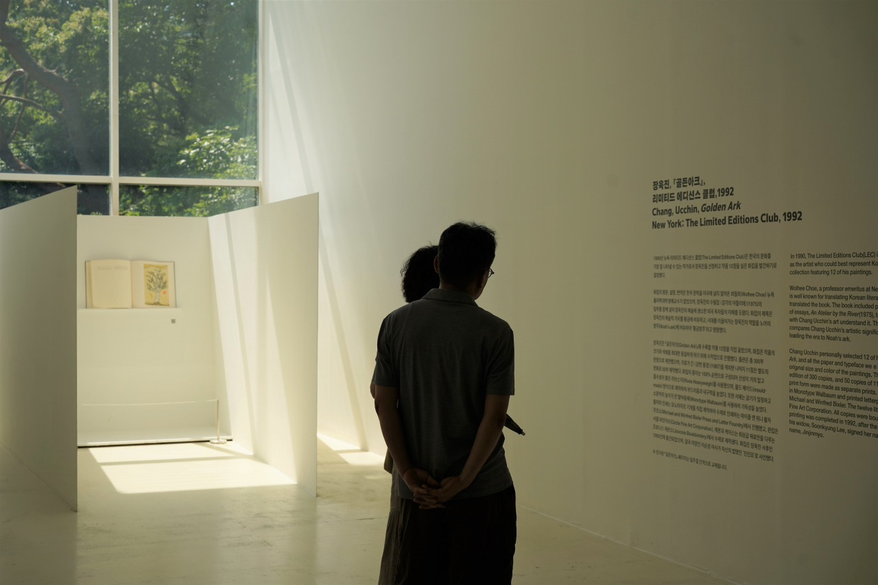 Visitors view displays at Chang Ucchin Museum of Art's exhibition on Tuesday. (Lee Si-jin/The Korea Herald)