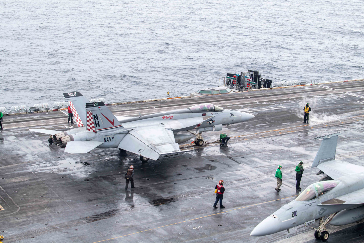 This photo, taken on Friday, shows F/A-18E Super Hornets during the Freedom Edge trilateral exercise involving South Korea, the United States and Japan. (The US Navy's USS Theodore Roosevelt aircraft carrier)