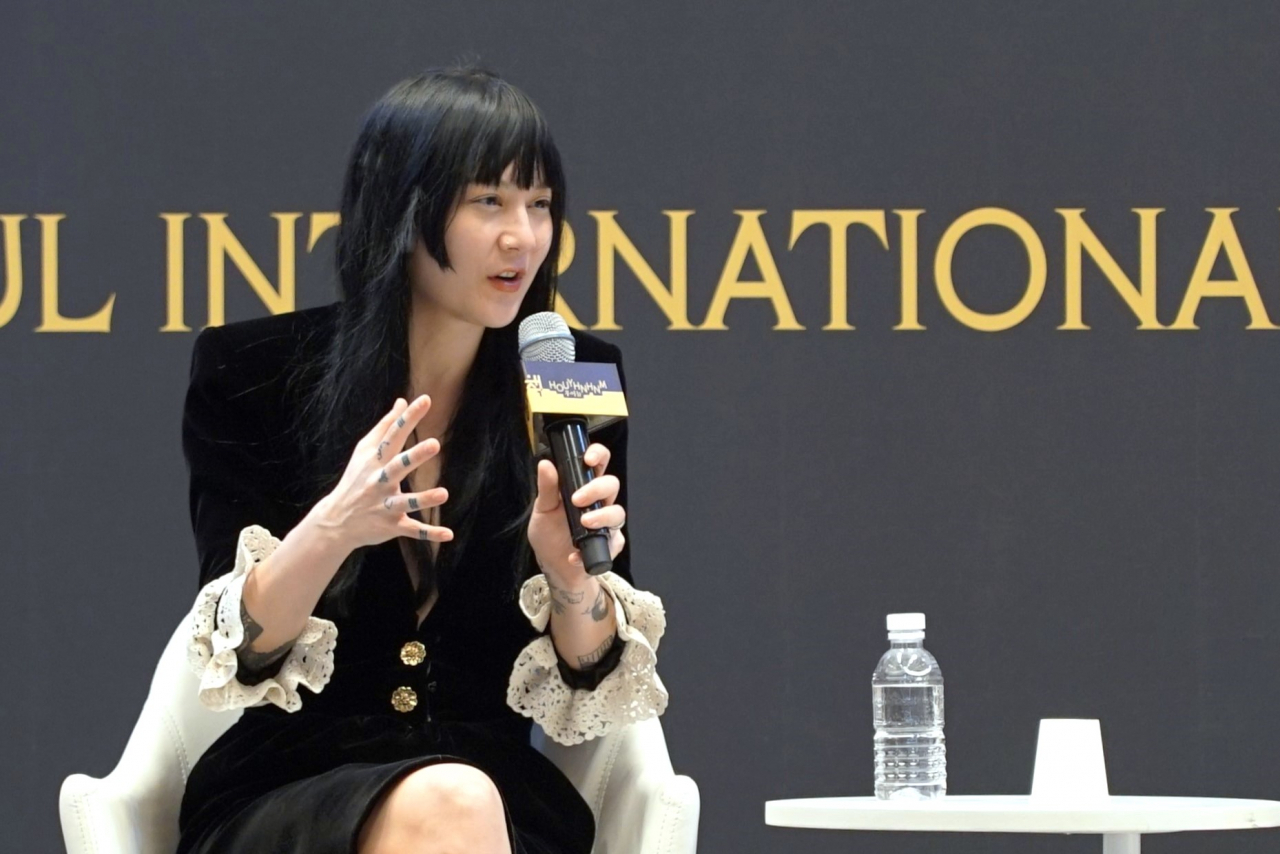 Michelle Zauner speaks at a talk at the Seoul International Book Fair, held at Coex, on Thursday. (Hwang Dong-hee/The Korea Herald)
