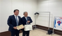 SK chief visits Japan to ask support for Busan’s Expo bid