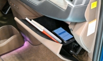 Hyundai Mobis supplies overhead bin-shaped glove compartment for Kia EV9