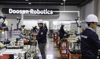 [From the Scene] Doosan to double output of 'cobots' with advanced but cheaper sensors by 2024