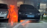 Carmakers eye transparency as EV fire probes escalate