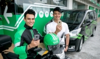 SK Group acquires stake in Grab