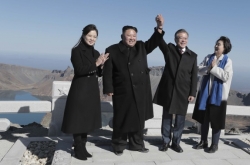 Leaders of two Koreas stand atop ‘sacred’ Paektusan