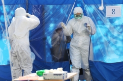 S. Korea tightens quarantine on arrivals from Europe, new virus cases dip below 100 again