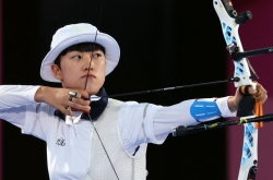 Lawmakers condemn misogynistic attacks on Olympic archer