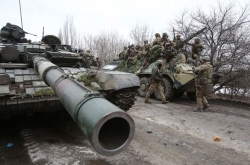 Russian invasion convoy masses near Ukraine capital