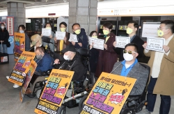 [Newsmaker]Disabled advocacy group ends subway protest after meeting transition team