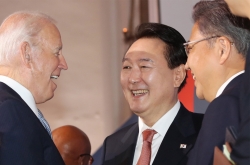 Yoon meets with Biden, Kishida amid much fuss