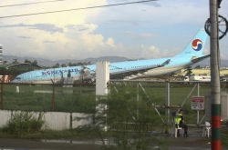 Korean Air plane overshoots runway, shuts Philippine airport