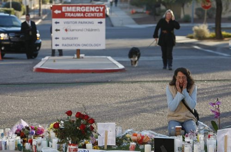 U.S. charges gunman in lawmaker shooting