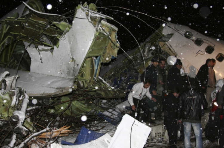 Plane with 106 people crashes in Iran; 29 survive