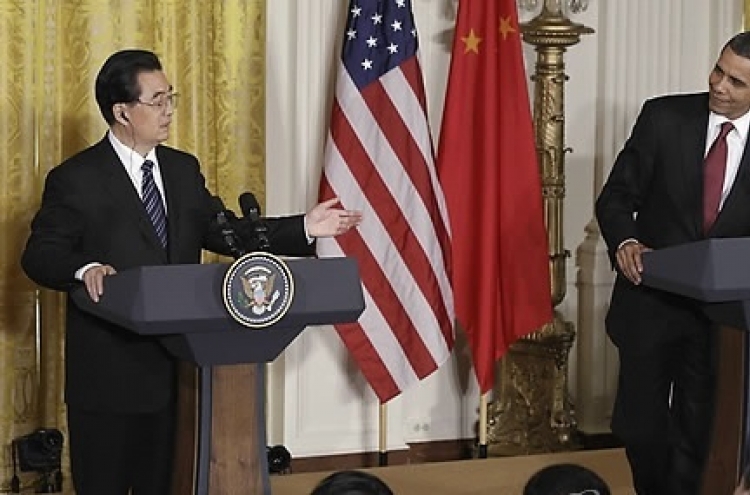 Obama, Hu call on N. K. to stop provocations